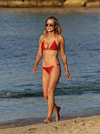 Helen Flanagan sexy in red bikini in a beach in Dubai