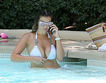 Busty Imogen Thomas relaxing in white bikini in the hot tub at her Las Vegas pool