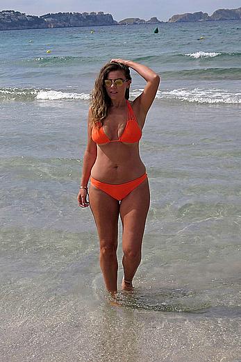 Imogen Thomas in orange bikini in Mallorca