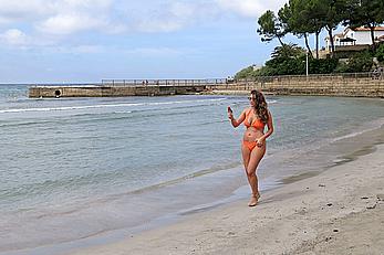 Imogen Thomas in orange bikini in Mallorca