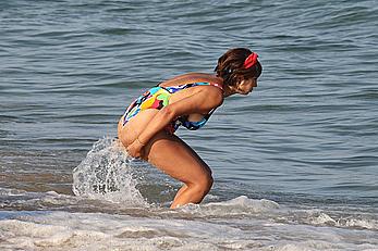 Jackie Cruz round ass and sideboob on a beach