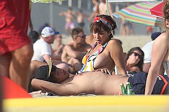 Jackie Cruz round ass and sideboob on a beach