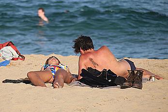 Jackie Cruz round ass and sideboob on a beach