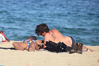 Jackie Cruz round ass and sideboob on a beach