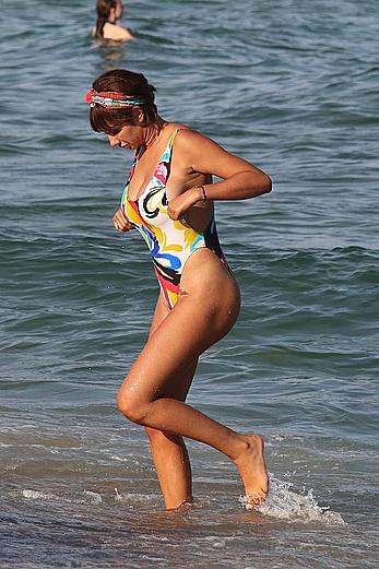 Jackie Cruz round ass and sideboob on a beach