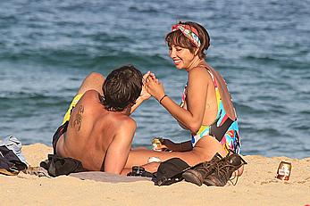 Jackie Cruz round ass and sideboob on a beach