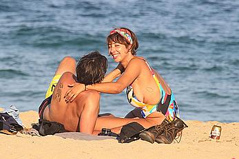 Jackie Cruz round ass and sideboob on a beach