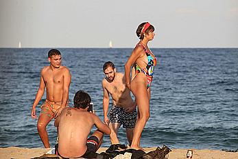 Jackie Cruz round ass and sideboob on a beach