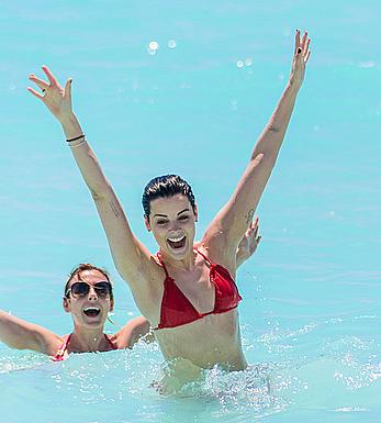 Jaimie Alexander in red bikini at the pool in Cancun