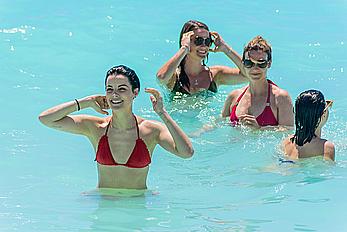 Jaimie Alexander in red bikini at the pool in Cancun