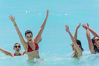 Jaimie Alexander in red bikini at the pool in Cancun