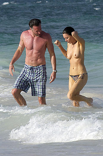 Jaime Murray caught topless at the beach in Mexico