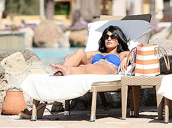 Jasmin Walia seen out in blue bikini by the pool in Dubai