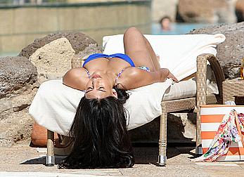 Jasmin Walia seen out in blue bikini by the pool in Dubai