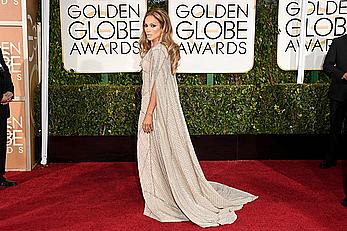 Jennifer Lopez llegs and sexy cleavage at 72nd Annual Golden Globe Awards