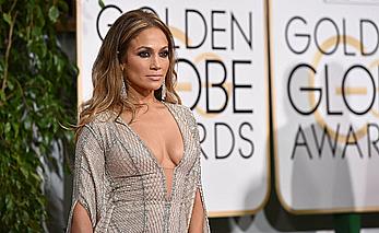 Jennifer Lopez llegs and sexy cleavage at 72nd Annual Golden Globe Awards