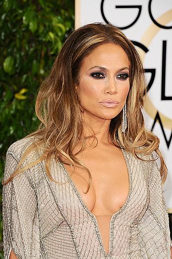 Jennifer Lopez llegs and sexy cleavage at 72nd Annual Golden Globe Awards