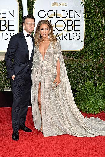 Jennifer Lopez llegs and sexy cleavage at 72nd Annual Golden Globe Awards