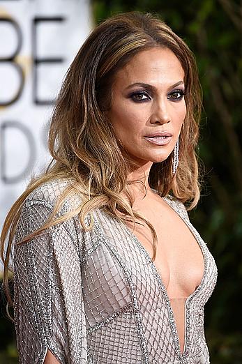 Jennifer Lopez llegs and sexy cleavage at 72nd Annual Golden Globe Awards