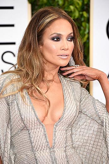 Jennifer Lopez llegs and sexy cleavage at 72nd Annual Golden Globe Awards