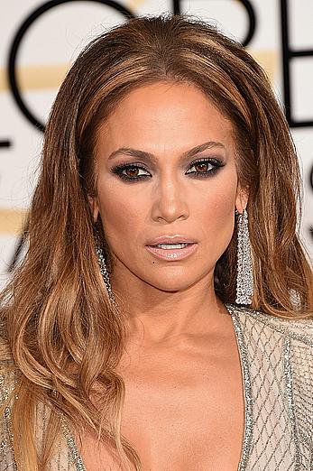 Jennifer Lopez llegs and sexy cleavage at 72nd Annual Golden Globe Awards