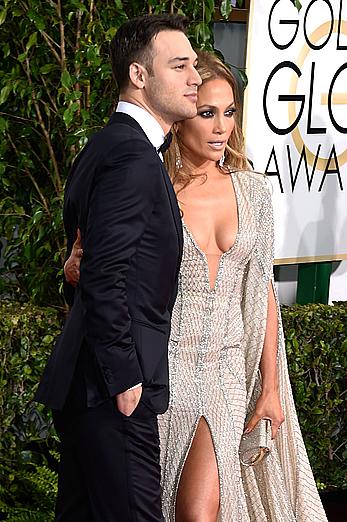 Jennifer Lopez llegs and sexy cleavage at 72nd Annual Golden Globe Awards