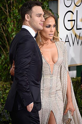 Jennifer Lopez llegs and sexy cleavage at 72nd Annual Golden Globe Awards