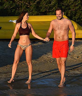 Jennifer Metcalfe pokies in wet bikini on a beach in Ibiza