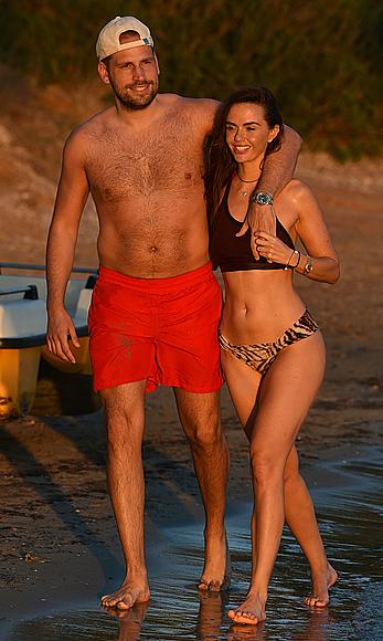 Jennifer Metcalfe pokies in wet bikini on a beach in Ibiza