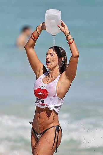 Jennifer Nicole Lee shows big boobs through wet transparent top on the beach in Miami