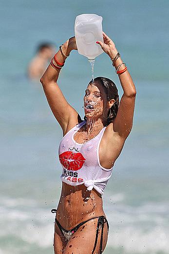 Jennifer Nicole Lee shows big boobs through wet transparent top on the beach in Miami