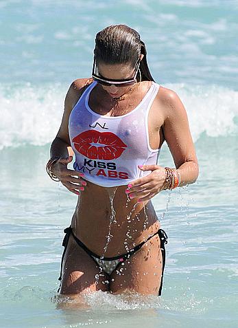 Jennifer Nicole Lee shows big boobs through wet transparent top on the beach in Miami