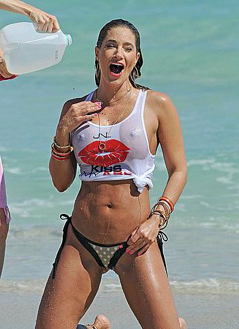 Jennifer Nicole Lee shows big boobs through wet transparent top on the beach in Miami