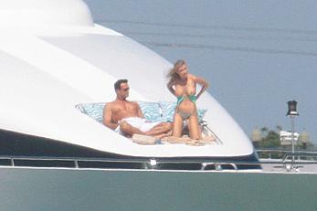 Joanna Krupa goes topless on a yacht in Miami