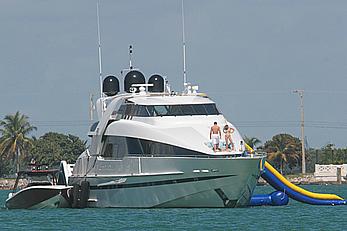 Joanna Krupa goes topless on a yacht in Miami