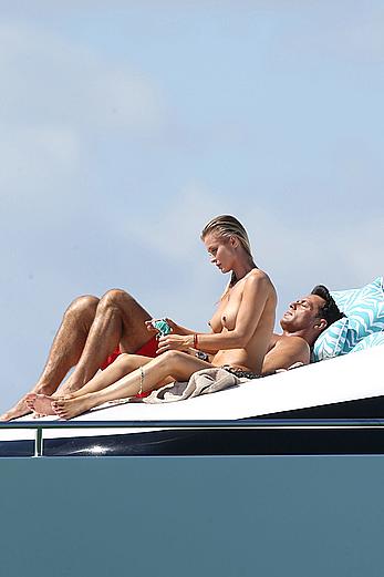 Joanna Krupa goes topless on a yacht in Miami