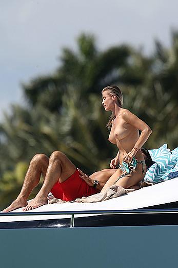 Joanna Krupa goes topless on a yacht in Miami