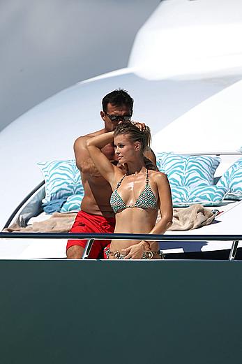 Joanna Krupa goes topless on a yacht in Miami