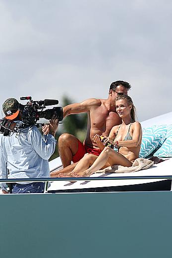 Joanna Krupa goes topless on a yacht in Miami