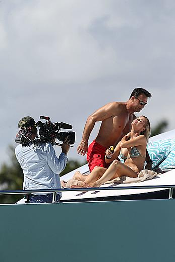 Joanna Krupa goes topless on a yacht in Miami