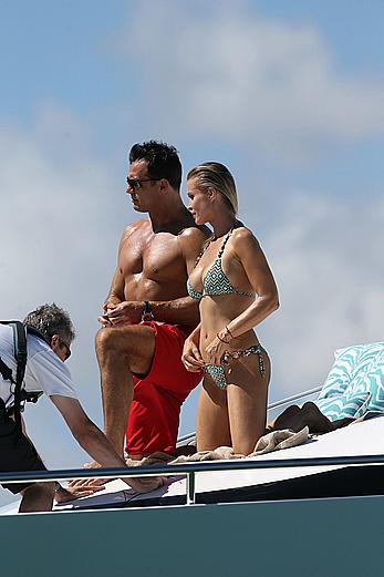 Joanna Krupa goes topless on a yacht in Miami