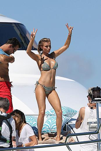 Joanna Krupa goes topless on a yacht in Miami