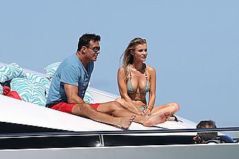 Joanna Krupa goes topless on a yacht in Miami