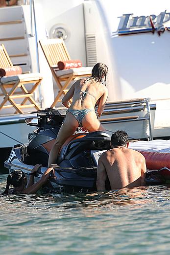 Joanna Krupa goes topless on a yacht in Miami