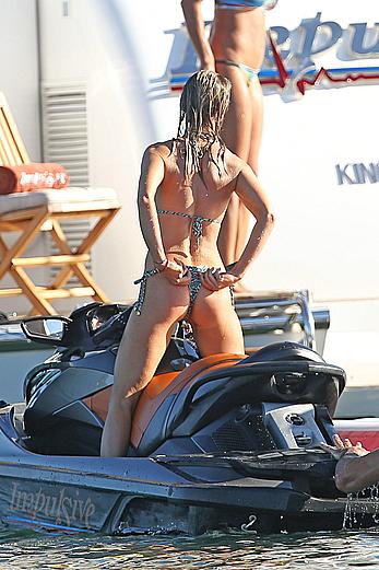 Joanna Krupa goes topless on a yacht in Miami