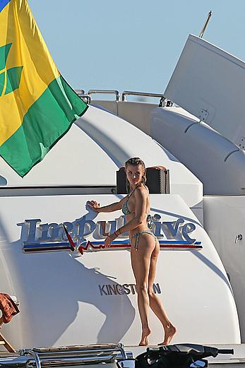 Joanna Krupa goes topless on a yacht in Miami