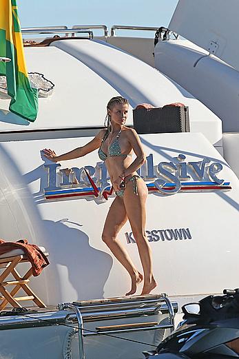 Joanna Krupa goes topless on a yacht in Miami