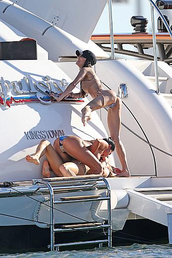 Joanna Krupa goes topless on a yacht in Miami