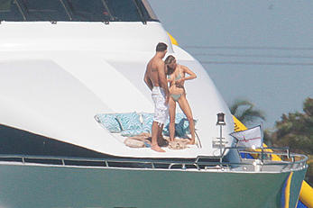 Joanna Krupa goes topless on a yacht in Miami