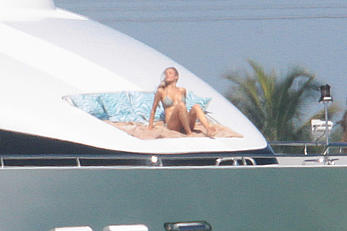 Joanna Krupa goes topless on a yacht in Miami